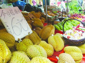 每天300吨热带水果运进岛城曾经的水果贵族